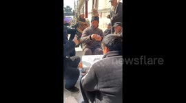 Playing Poker with Bricks on the Head in Jiaozuo, China