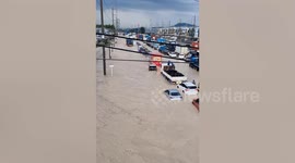 Floods cover roads as heavy rain hits Thailand