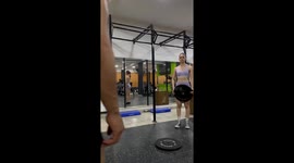 Gym fail: Mirror shatters after weight plate slams into it