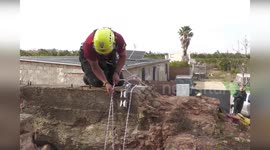 Rescuers recovers two injured people from 35ft deep well in Spain
