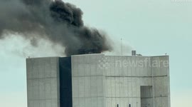 Black smoke billows from building as Manhattan skyscraper catches fire