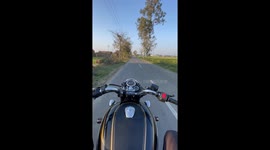 I’m riding on my bike in evening time sunset view with beautiful nature  good vibes , enjoying nature views driving safe