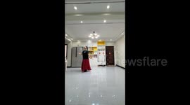 Man Stuns with Ancient Dance in Long Dress in Handan, China