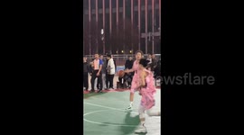 Girl Bounces to Ground After Running Into Opponent at Basketball Game in Guizhou, China