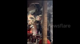 Benches with a large dragon mounted on them in Jinhua, China