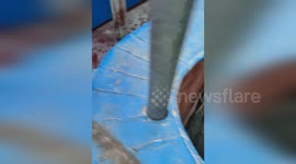 Three-year-old boy lowered into cargo hold to retrieve ship part in film-like scene