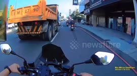 Scooter rider almost crushed by truck in Taiwan