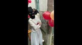 Bridesmaids Dressed as Bandits at Chinese Wedding