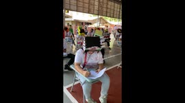 Students wear hilarious anti-cheating hats at exams in the Philippines