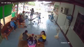 Storm blows through family's patio in Thailand