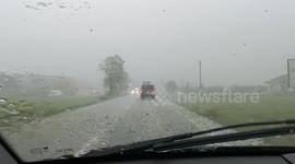 Driver and Passengers Have to Travel Through Terrible Hailstorm