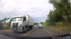 WTF Moment: Stone Fly's Out Of Truck Damaging Oncoming Vehicle