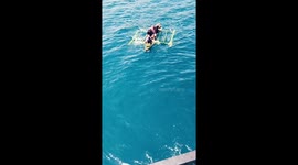 Cargo crew to the rescue: fishermen saved from sinking boat in Philippines