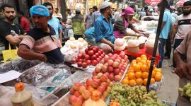 Muslim devotees gather in Old Dhaka, Bangladesh to buy food for iftar