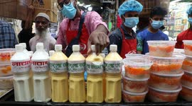 People buy food for iftar in Old Dhaka, Bangladesh