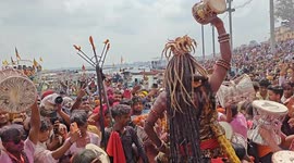 Varanasi Skies turn grey as Shiva Devotees play Masan Holi at Manikarnika Ghat