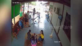Storm slams into home as family sit on patio