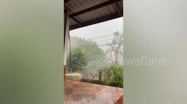 Storm lashes homes as monsoon season nears Thailand
