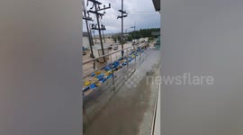 Crates swept away by flood in eastern Thailand