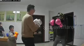 Hilarious moment son accidentally punches mum in family boxing match