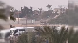 Israeli tanks storm the outskirts of the town of Al-Qarara, Gaza