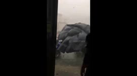 The moment a tornado brought strong winds and heavy rain swept across the mountainous region of northern Vietnam