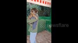 Devoted Caretaker Nurtures Young Animals at Zoo in Huzhou, China