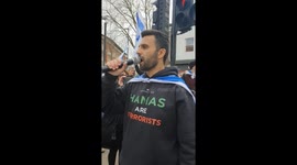 Pro-Israel demonstrators chant ”Terrorists, terrorists, off our streets” in London