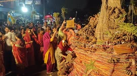 The Indian women's gather around a bonfire and pray and perform rituals Holika Dahan