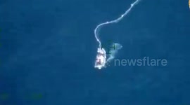 China Coast Guard blasts water cannon on Filipino boat and leaves it 'severely damaged'