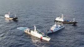 Chinese ships encircle Philippine Coast Guard vessel at sea