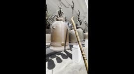 Satisfying ASMR video of huge brass bells being struck