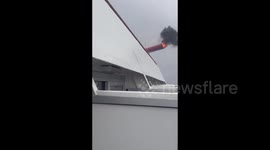 Video of smoke pouring out of exhaust funnel after fire breaks out on cruise ship