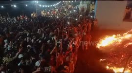 This scene is from Phalain village of Chhata tehsil of Mathura. A huge Holika is burnt here from which the form of devotee Prahlad comes out of this burning fire safely.