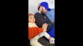Tiny tot asserts her domain over dad amidst clippers and combs
