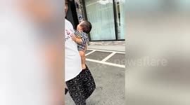 Baby bursts into laughter with mum's wacky face