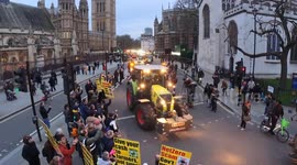 More than 1oo tractors arrive in Parliament Square in a go-slow protest against the UK government