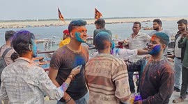 People's gather in Varanasi ghat to celebrate Colour full Holi