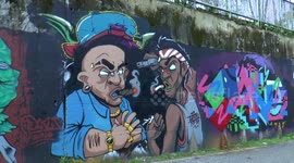Humorous graffiti featuring smoking in Kuching,Malaysia