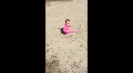 Funny Baby girl doesn't like sand
