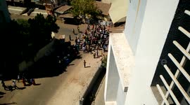 group of people fighting over issues with cops