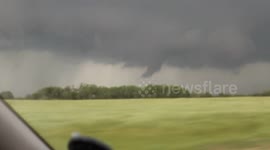 Funnel cloud from tornado warned storm in southern Kansas