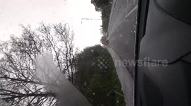 Driving through sleet hail and snow Shropshire UK in april