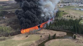 Fire tears through rail trestle bridge in Canada