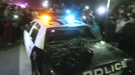 Protesters destroy police car during Trump Rally in California