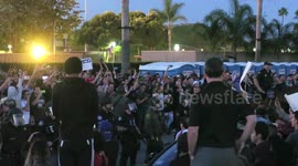Donald Trump supporters and protesters clash at rally in California