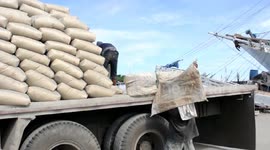 Labours Work at Paotere Port in Makassar