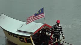River ferries crossing the Sarawak River in Borneo