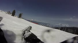Girl crashes after ski jump