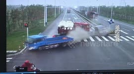 Lucky driver escapes being crushed by lorry